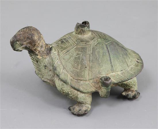 A Chinese archaic bronze tortoise lamp base, probably Six Dynasties, 4th-5th century A.D. 15.5cm long, 9cm high, restoration to head
